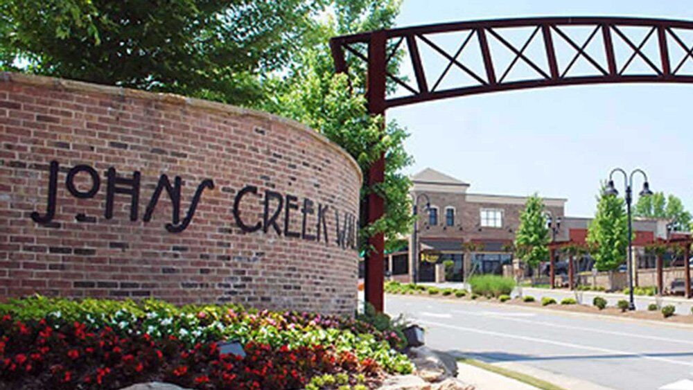 Welcome sign to Johns Creek Georgia