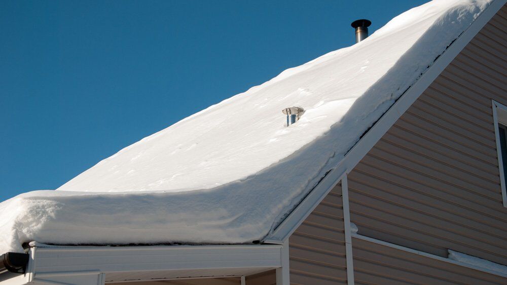 lots_of_snow_on_roof Lots of Snow on a Rooftop