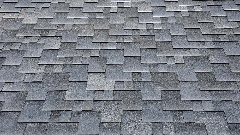 New asphalt shingles installed during a professional reshingling project in Atlanta.