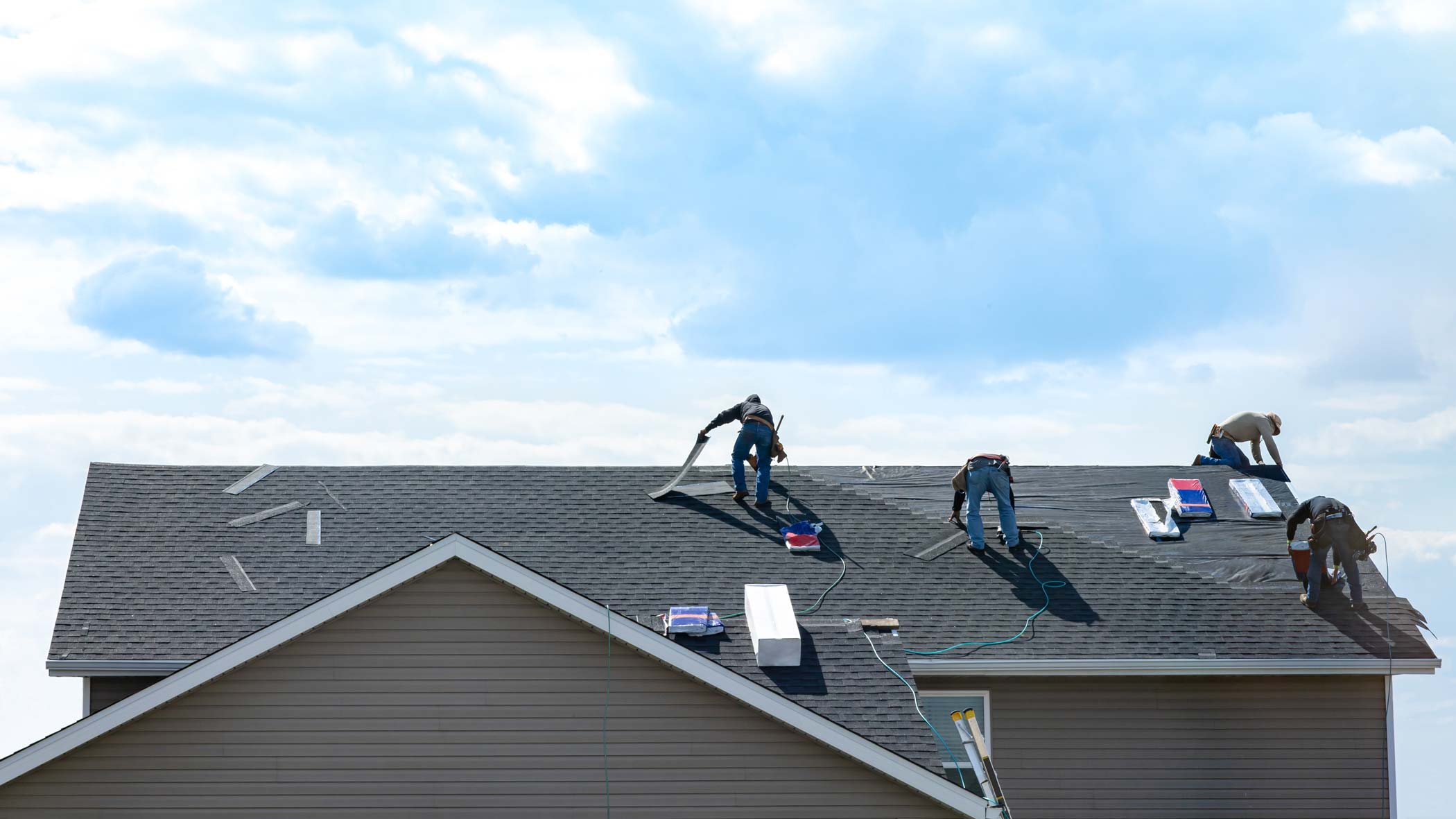 KTM Roofing repairing damaged roof in Atlanta, GA.