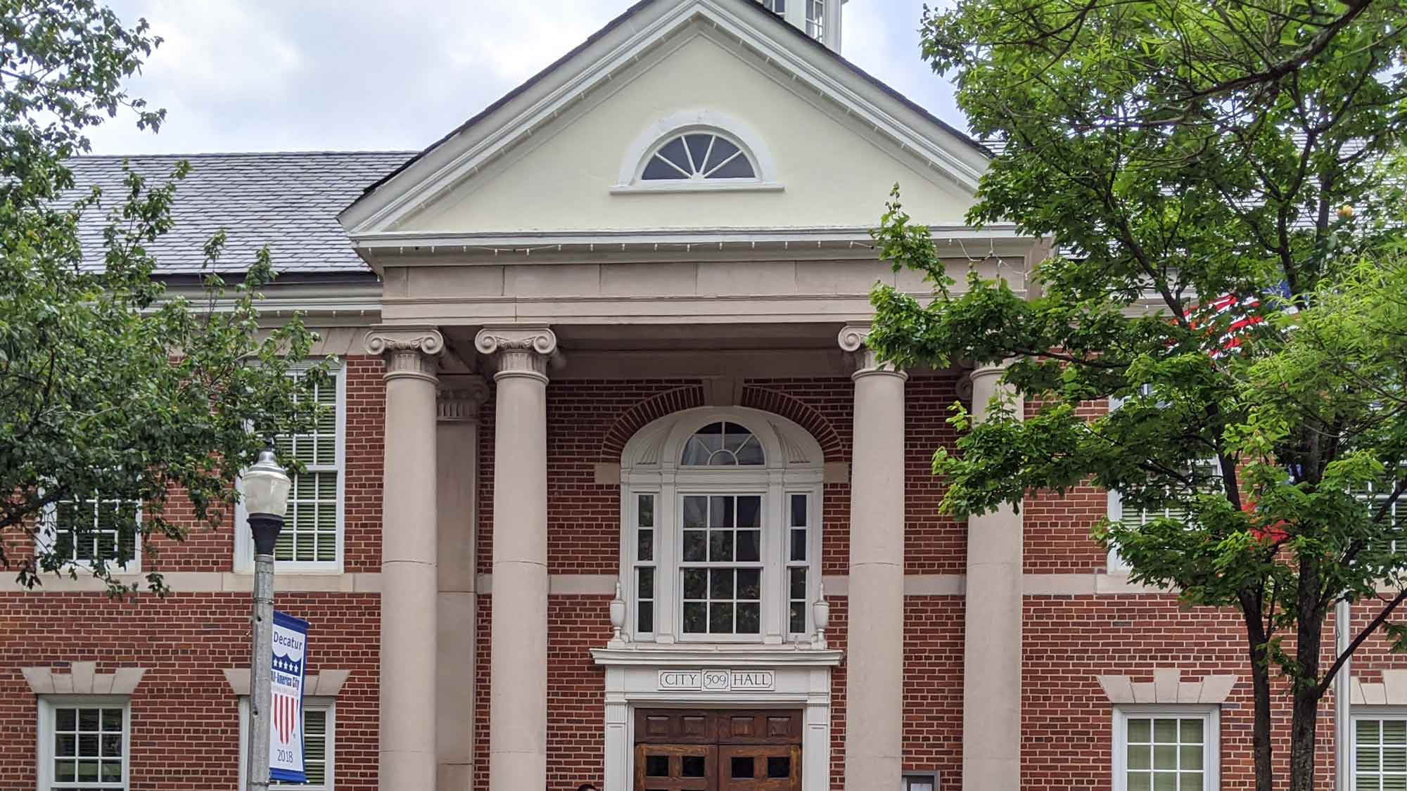 Decatur City Hall historic building after commercial roof replacement by KTM Roofing in Atlanta.