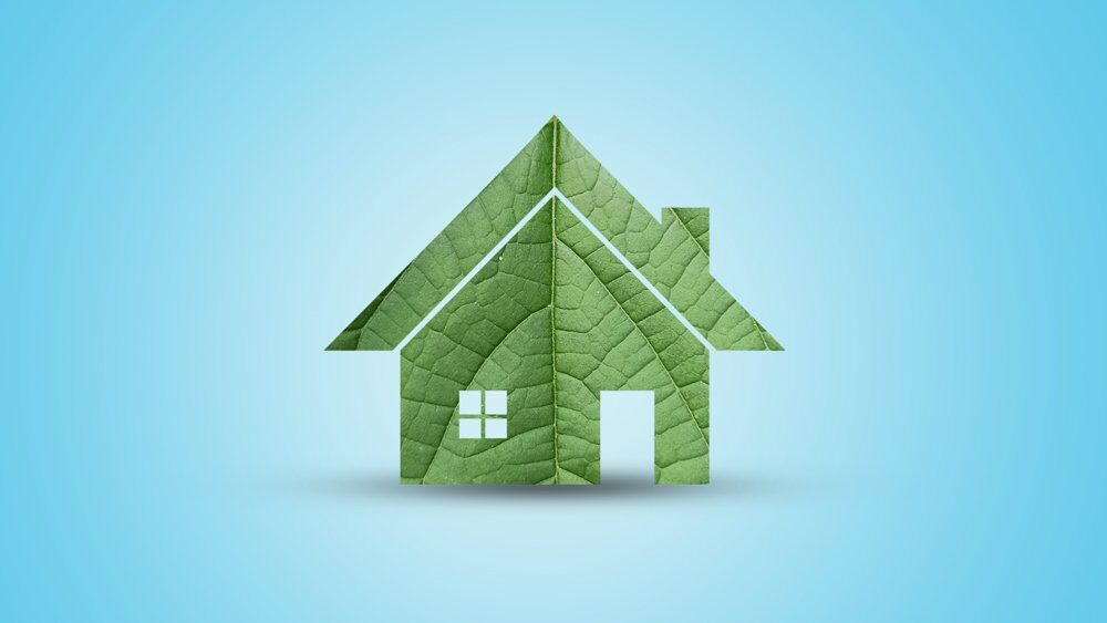 Earth Day with Home Shaped Out of a Leaf