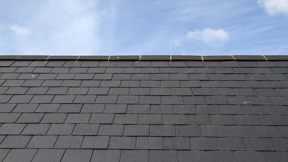 Slate roof against blue sky
