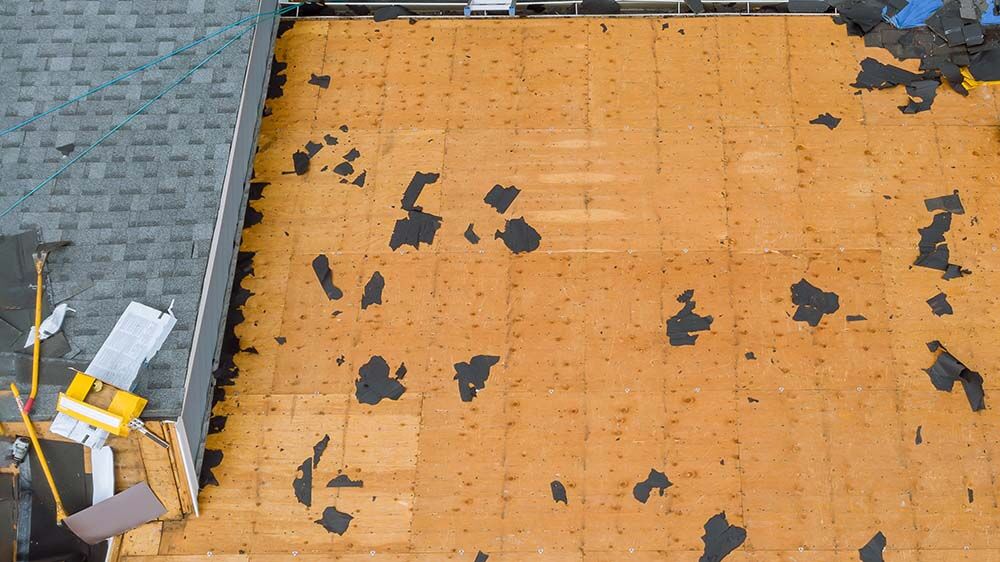Removal of old roof and replacement with all new shingle