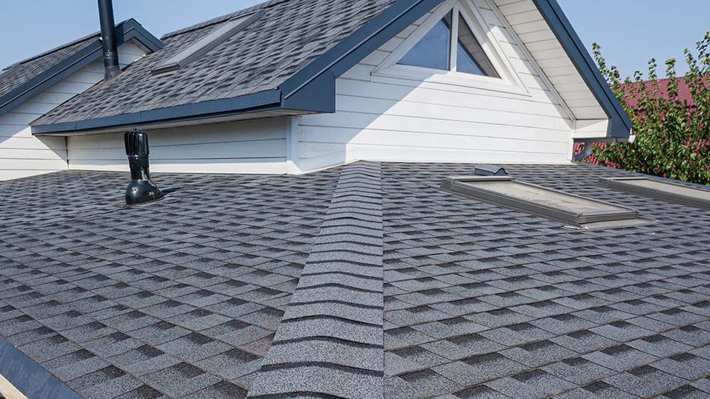 Asphalt roof shingle on two story residential house