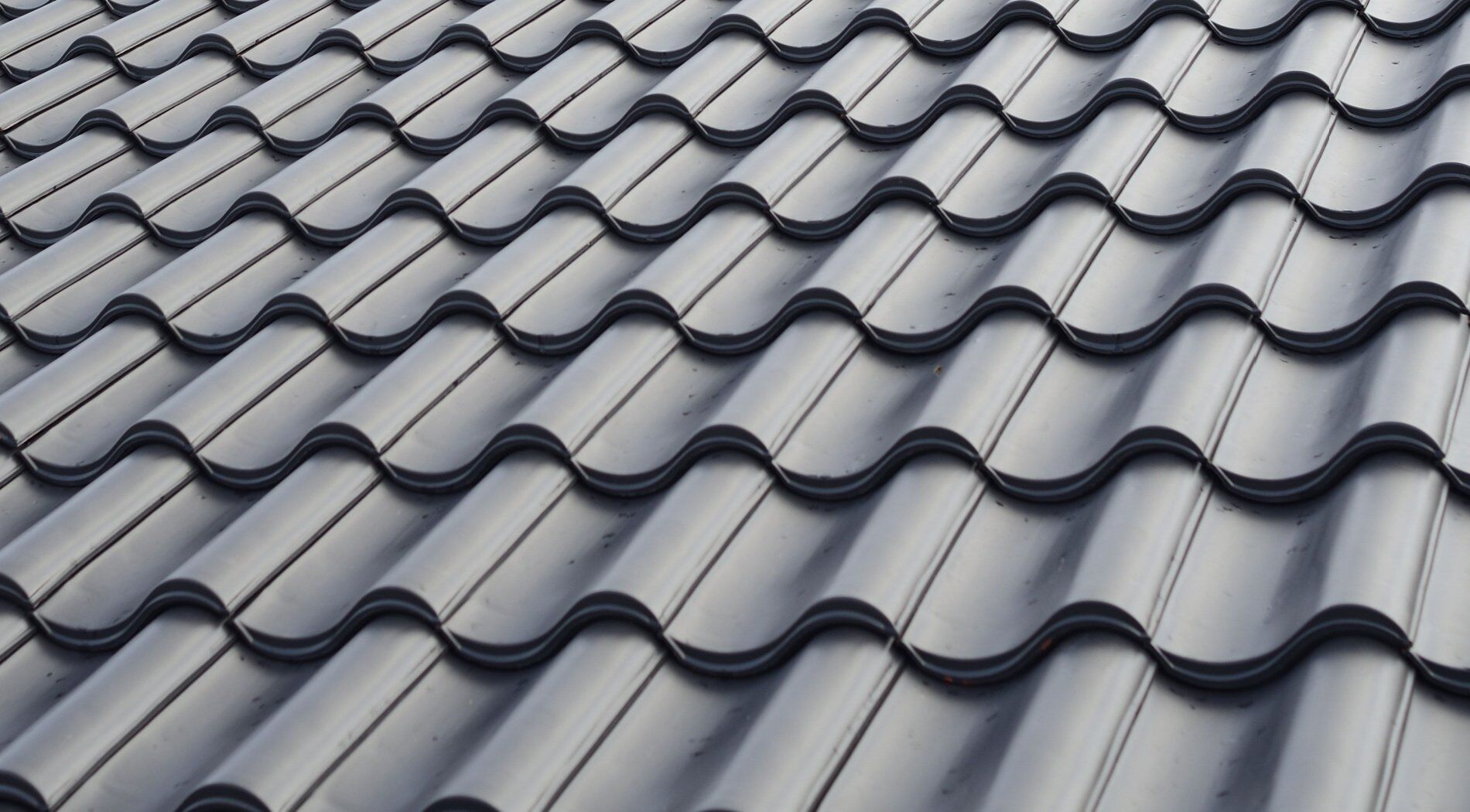 Synthetic roofing tiles