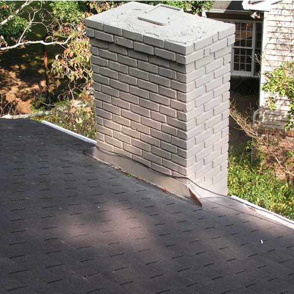 Lightly damaged chimney on a residential home.