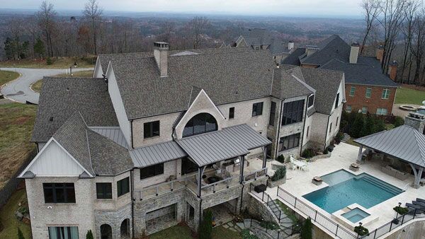Asphalt roofing on a large home in Sandy Springs, GA.