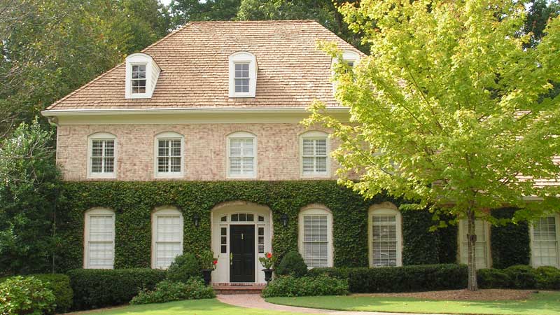 Home with cedar shingle roofing in North Atlanta.