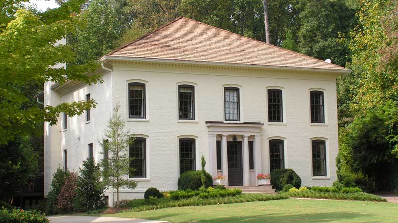 Two story home with new wood roofing in Peachtree Corners, GA.