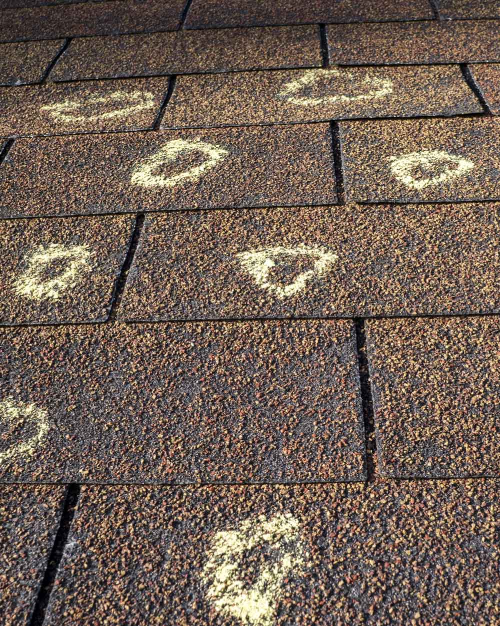 Yellow roof markings showing hail damage