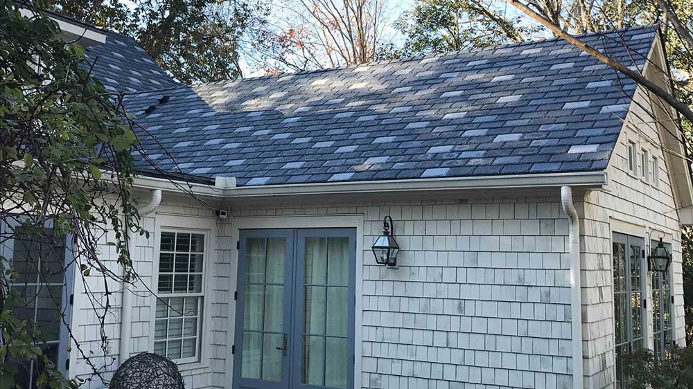 ktm-blue-shade-synthetic-slate-roof Blue synthetic slate roof home | KTM Roofing
