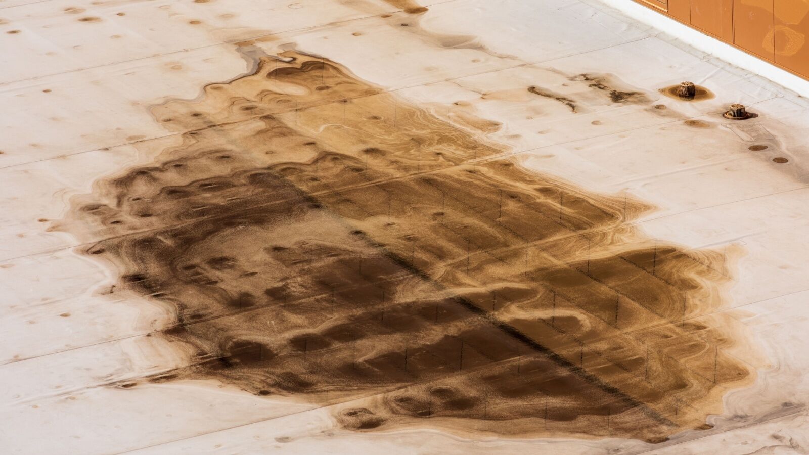 Commercial flat roof has water ponding damage in Atlanta, GA.